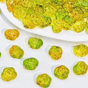 Detailed view of lime green rose-shaped glass beads for DIY jewelry crafts