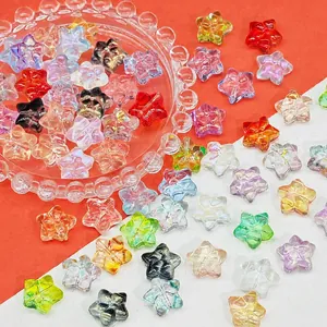 Close-up of colorful translucent glass star beads for DIY jewelry crafts 14x14x8mm