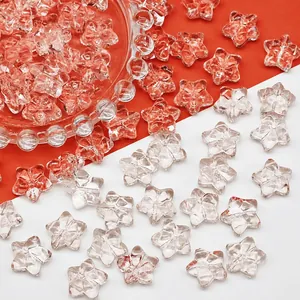 Macro detail of transparent pink star glass beads for DIY jewelry making