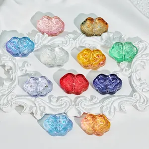 Detailed macro shot of colorful Ruyi cloud glass beads for DIY jewelry, size 9x13x4mm