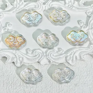 Macro view of pearly auspicious cloud-shaped glass beads for DIY jewelry and tassel making