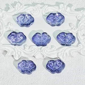 Macro detail of purple semi-transparent cloud Ruyi beads for DIY jewelry accessories