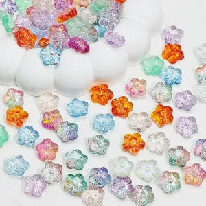 Detailed macro view of colorful gradient sakura glass flower beads for DIY jewelry