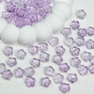 Macro view of translucent purple cherry blossom glass beads for DIY jewelry making