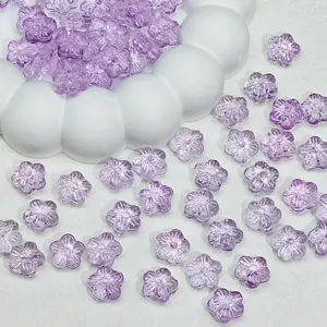 Macro view of translucent purple cherry blossom glass beads for DIY jewelry making