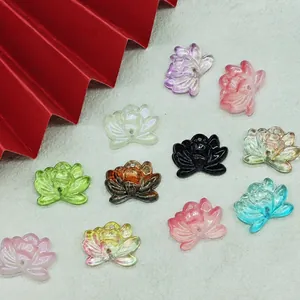 Detailed macro view of colorful translucent lotus-shaped glass beads for DIY jewelry making.