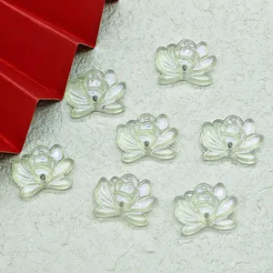 Detailed view of 19x15x6mm translucent lotus glass beads for DIY jewelry.