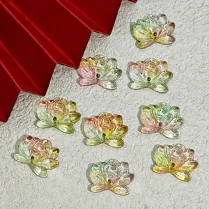 Close-up of vibrant dual-hole glass lotus flower beads for DIY jewelry making