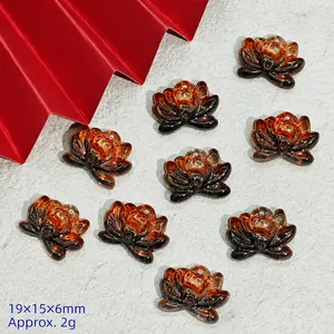 Detailed view of 19x15x6mm amber lotus glass beads for DIY jewelry making.