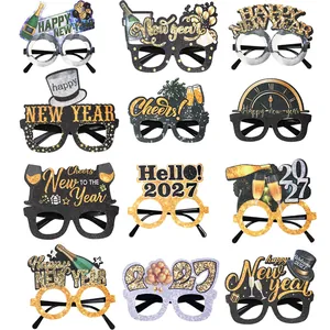 Grid view of 12 distinct 2027 New Year party glasses with glitter slogans and icons