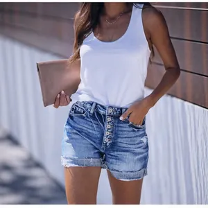 Stylish women's blue high-waist ripped denim shorts with a classic button fly design
