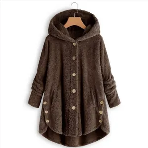 Close-up of cozy brown hooded plush coat with wooden buttons and irregular hem