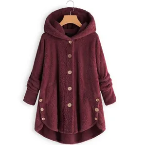 Detail of burgundy plush hooded coat with wooden buttons and irregular hem