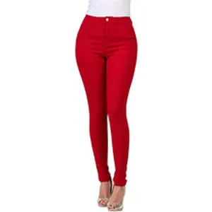Close-up detail of women's vibrant red high-waisted skinny jeans with a slim fit design