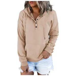 Detailed view of a stylish khaki long sleeve hoodie with drawstring and buttons.