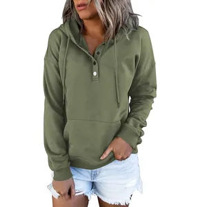 Detailed view of olive green oversized women's hoodie with long sleeves and buttons
