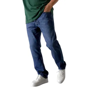 Detailed view of classic dark blue straight-leg denim jeans for men shown on a model.