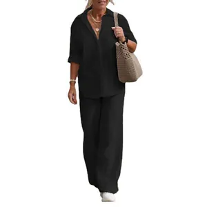 Full view of women's casual black set featuring a lapel shirt and matching wide-leg pants