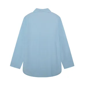 Detailed back view of a light blue long-sleeved shirt from a casual women's set