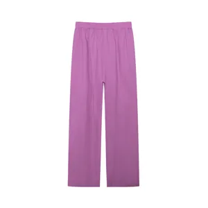 Close-up of purple high-waist wide-leg casual trousers in solid color design.