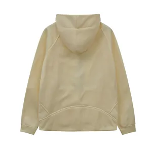 Back view of a minimalist cream-colored half-zip sports hoodie with soft fleece lining