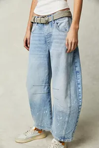 Casual light wash wide-leg denim jeans for women with distressed paint details