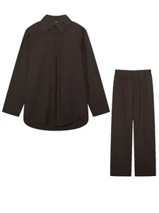 Two-piece set with a dark brown long-sleeve shirt and matching wide-leg trousers