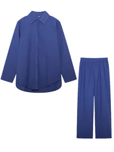 Full view of royal blue two-piece set with long-sleeve shirt and wide-leg trousers