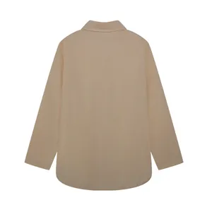 Detailed back view of a minimalist women's solid color casual long-sleeved shirt with lapel