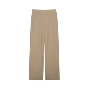 Front view of solid beige wide-leg leisure trousers with a comfortable elastic waistband