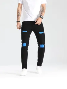 Jeans Skinny Strappati da Uomo di Tendenza Denim Nero Distressed Patchwork Blu Slim Fit Pantaloni Elasticizzati Streetwear Moda Uomo