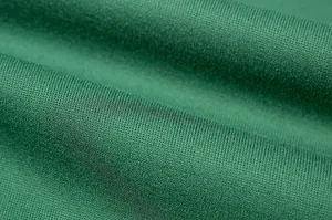 Macro della trama del tessuto a maglia verde di alta qualità per felpa da donna