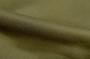 Macro close-up detail of the soft olive green fleece fabric texture for hoodies