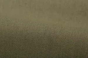 Macro detail view of olive green woven linen fabric texture for women's casual clothing set