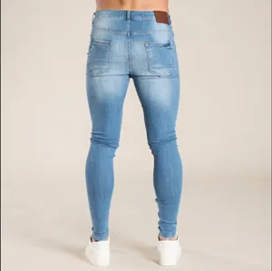 Vue arrière détaillée d'un jean skinny en denim bleu pour homme à coupe étroite