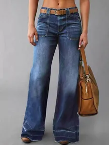 Stylish women's high waisted flare denim jeans with large front patch pockets and washed finish