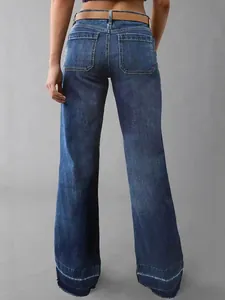 Professional back view of women's dark wash flared denim jeans with distressed hem details