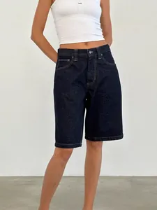 Women's classic dark blue denim bermuda shorts featuring a high waist and slim fit