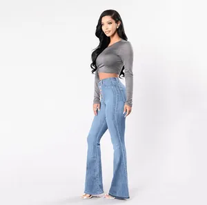 Full length side view of high-waisted blue flare jeans with stretch denim fabric