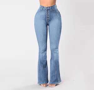 Detail view of women's high-waisted stretch flared denim jeans with button fly closure.