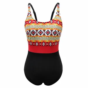 Front view of a plus size one-piece swimsuit featuring leopard and ethnic geometric prints