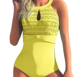 Elegant yellow one-piece swimsuit featuring intricate lace mesh and chest cutout design