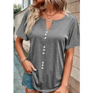 Detail view of a casual grey short-sleeved V-neck t-shirt featuring stylish white buttons
