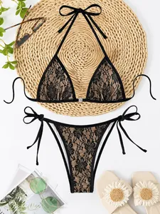 Sexytes schwarzes Spitzen-Halter-Bikini-Set mit seitlich gebundenem Höschen für den Strand
