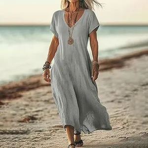 Loose grey V-neck cotton linen maxi dress perfect for beach vacations and summer wear.