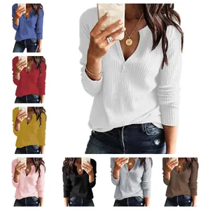 Waffle knit women's long sleeve V-neck Henley top shown in multiple elegant solid colors