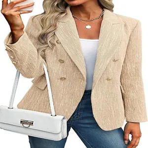 Detailed view of a tan double-breasted textured blazer for women autumn style