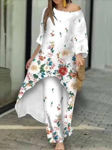 Zweiteiliges Resort-Set mit Blumendruck, High-Low-Tunika und passender weiter Hose