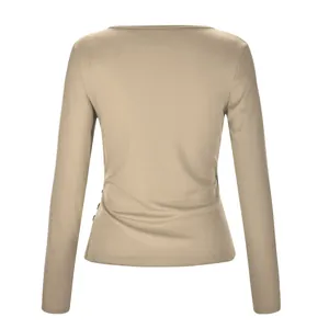 Detailed back view of a minimalist beige ribbed-knit long-sleeved T-shirt for women