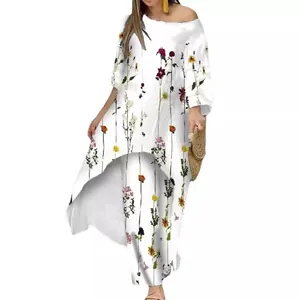 Zweiteiliges Set mit Blumenmuster, High-Low-Tunika und passender weit geschnittener Hose